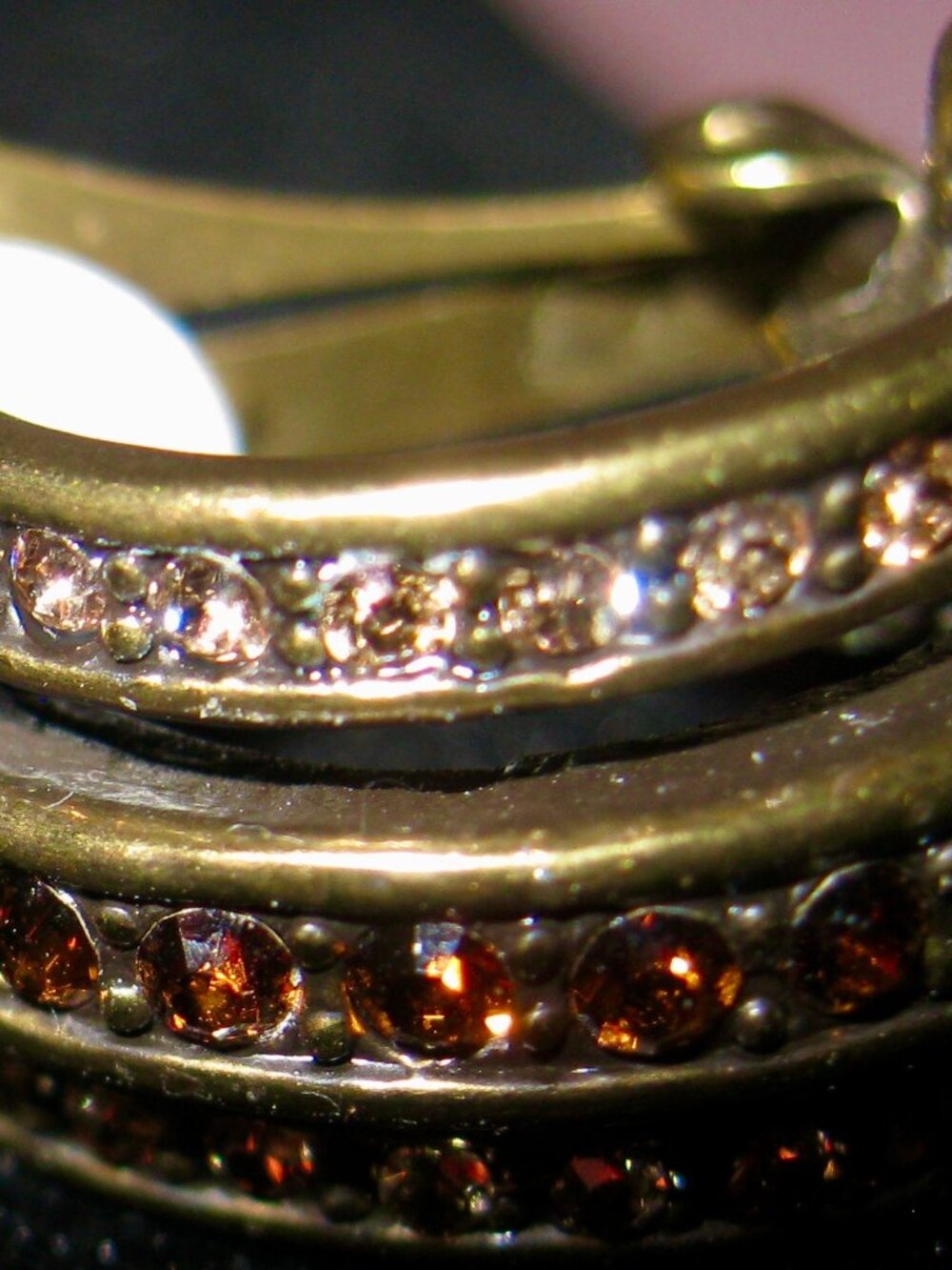 HEIDI DAUS FABULOUS CLIP-ON EARRINGS IN HER BRASS OX FINISH AND ROWS OF SPARKLE